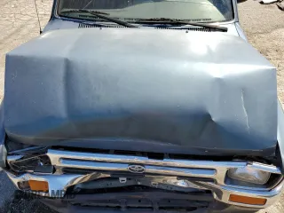 1994 Toyota Pickup DLX z VIN 4TARN81P2RZ175695, wystawiony jako Copart lot #50415385 z przebiegiem 258 048 mil mil oraz Szkoda całkowita • Salvage title. Historia ofert i sprzedaży dostępna na DreamBid. Obrazek 11.