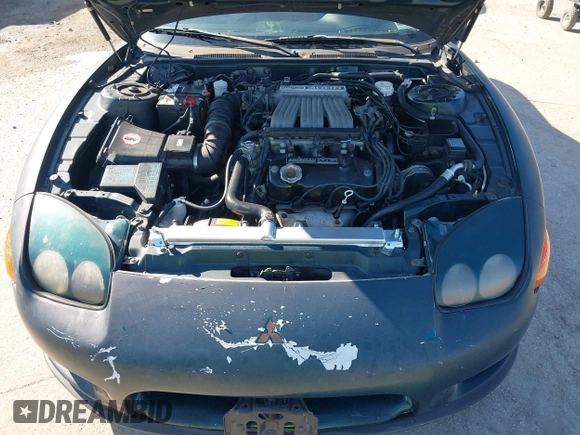 1997 Mitsubishi 3000GT z VIN JA3AM44H8VY001162, wystawiony jako IAAI lot #41933754 z przebiegiem 157 314 mil mil oraz . Historia ofert i sprzedaży dostępna na DreamBid. Obrazek 10.