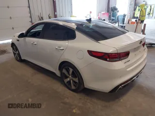 2018 Kia Optima SX with VIN 5XXGW4L27JG237960, listed as a IAAI auction lot 41956461 with 87,085 mi miles and . Bid and sale history available at DreamBid. Image 3.