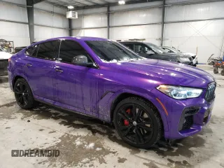 2022 BMW X6 M50i z VIN 5UXCY8C07N9K85135, wystawiony jako Copart lot #45385725 z przebiegiem 57 106 mil mil oraz Szkoda całkowita • Salvage title. Historia ofert i sprzedaży dostępna na DreamBid. Obrazek 4.