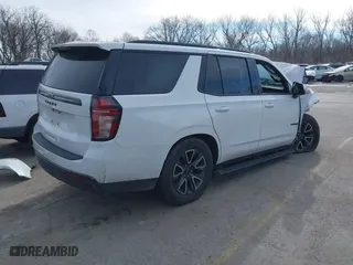 2021 Chevrolet Tahoe Z71 with VIN 1GNSKPKDXMR318664, listed as a IAAI auction lot 41382037 with 136,125 mi miles. Bid and sale history available at carsss.com. Image 4.