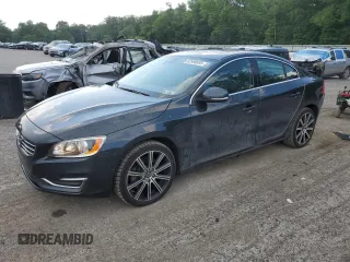 2015 Volvo S60 T5 Premier с VIN YV1612TB6F1299877, выставлен на аукционе Copart как лот 62590695 с пробегом 91 096 миль миль и Списание • Salvage title. История ставок и продаж доступна на DreamBid. Изображение 1.