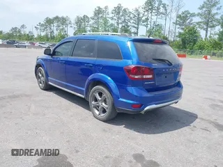 2015 Dodge Journey Crossroad with VIN 3C4PDCGG9FT617772, listed as a IAAI auction lot 42123413 with 146,778 mi miles and . Bid and sale history available at DreamBid. Image 3.