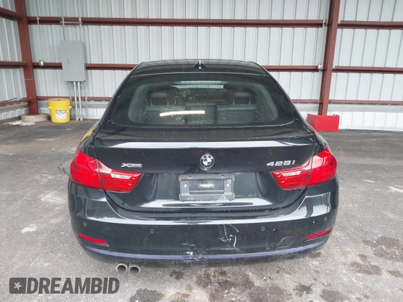 2015 BMW 4 Series 428i xDrive with VIN WBA4C9C57FD331872, listed as a IAAI auction lot 42276675 with 106,543 mi miles and . Bid and sale history available at DreamBid. Image 16.