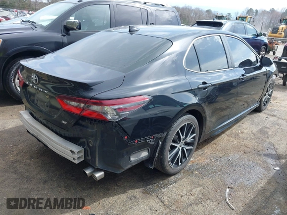 2022 Toyota Camry SE with VIN 4T1G11AK6NU660671, listed as a IAAI auction lot 41768738 with 74,867 mi miles. Bid and sale history available at carsss.com. Image 4.