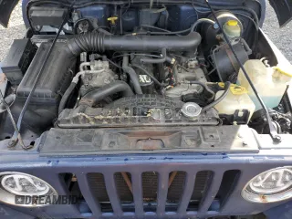 1997 Jeep Wrangler Sport with VIN 1J4FY19S2VP498840, listed as a Copart auction lot 50058885 with 151,697 mi miles and Salvage Title. Bid and sale history available at carsss.com. Image 12.