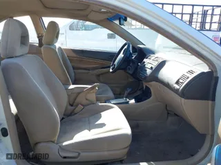 2003 Honda Civic EX with VIN 1HGEM22933L062174, listed as a IAAI auction lot 42024613 with 212,905 mi miles. Bid and sale history available at carsss.com. Image 5.