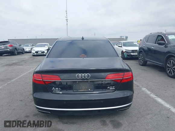 2015 Audi A8 L 4.0T with VIN WAU32AFD4FN033471, listed as a IAAI auction lot 42120112 with 174,882 mi miles. Bid and sale history available at carsss.com. Image 16.