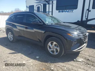2023 Hyundai Tucson SEL z VIN 5NMJBCAEXPH221710, wystawiony jako Copart lot #51915715 z przebiegiem 21 771 mil mil oraz Szkoda całkowita • Salvage title. Historia ofert i sprzedaży dostępna na DreamBid. Obrazek 4.