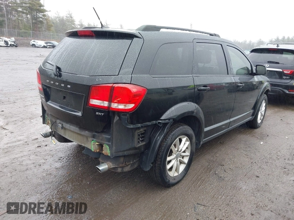 2015 Dodge Journey SXT with VIN 3C4PDDBG5FT639992, listed as a IAAI auction lot 41958496 with 132,410 mi miles and . Bid and sale history available at DreamBid. Image 4.