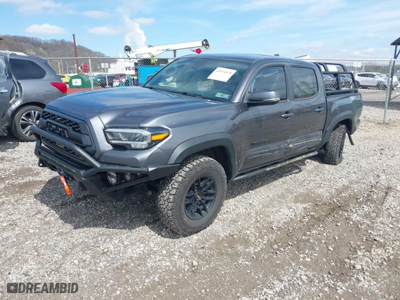 2021 Toyota Tacoma 4WD SR with VIN 3TYCZ5AN0MT039883, listed as a IAAI auction lot 41974378 with 92,082 mi miles. Bid and sale history available at carsss.com. Image 16.