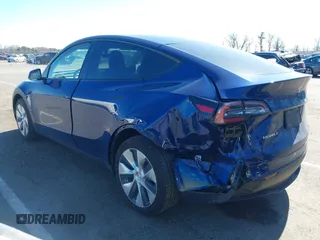 2020 Tesla Model Y Long Range with VIN 5YJYGDEF4LF005534, listed as a IAAI auction lot 41830910 with 32,438 mi miles and . Bid and sale history available at DreamBid. Image 3.