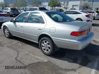 2001 Toyota Camry LE z VIN JT2BF22KX10342454, wystawiony jako IAAI lot #41939743 z przebiegiem 124 045 mil mil oraz . Historia ofert i sprzedaży dostępna na DreamBid. Obrazek 3.