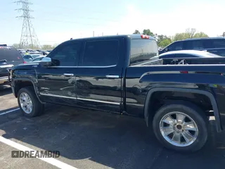2014 GMC Sierra 1500 Denali z VIN 3GTU2WEC2EG302474, wystawiony jako IAAI lot #41881222 z przebiegiem 197 221 mil mil oraz . Historia ofert i sprzedaży dostępna na DreamBid. Obrazek 14.