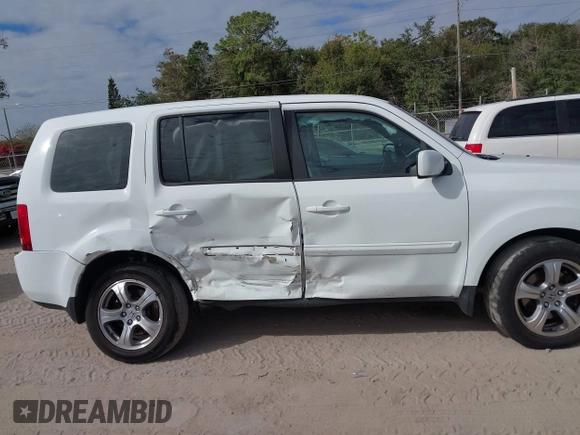 2013 Honda Pilot EX-L with VIN 5FNYF3H70DB043832, listed as a IAAI auction lot 40880885 with 250,712 mi miles and . Bid and sale history available at DreamBid. Image 6.