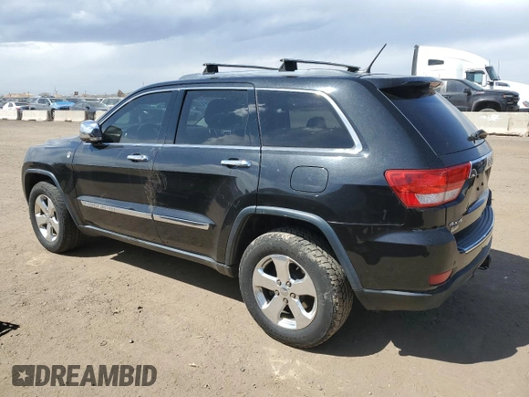 2013 Jeep Grand Cherokee Overland with VIN 1C4RJFCG5DC638927, listed as a Copart auction lot 52752615 with 117,494 mi miles and Salvage Title. Bid and sale history available at carsss.com. Image 2.