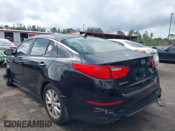 2015 Kia Optima EX z VIN 5XXGN4A72FG354497, wystawiony jako IAAI lot #42110643 z przebiegiem 117 751 mil mil oraz . Historia ofert i sprzedaży dostępna na DreamBid. Obrazek 3.