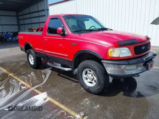1997 Ford F-150 with VIN 1FTEF18L8VLB04525, listed as a IAAI auction lot 42667152 with 235,105 mi miles and . Bid and sale history available at DreamBid. Image 1.