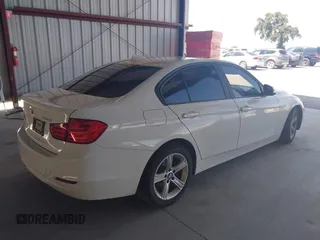 2013 BMW 3 Series 328i with VIN WBA3C1C50DF438180, listed as a IAAI auction lot 42082401 with 206,412 mi miles. Bid and sale history available at carsss.com. Image 4.