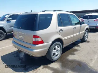 2004 Mercedes-Benz M 350 with VIN 4JGAB57E14A512245, listed as a IAAI auction lot 42452747 with 198,021 mi miles and . Bid and sale history available at DreamBid. Image 4.