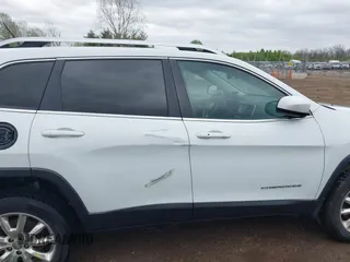 2014 Jeep Cherokee Limited with VIN 1C4PJMDB2EW281396, listed as a IAAI auction lot 42075036 with 113,578 mi miles and . Bid and sale history available at DreamBid. Image 13.