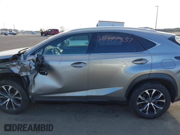 2015 Lexus NX 200t with VIN JTJBARBZ2F2002932, listed as a IAAI auction lot 41797857 with 205,902 mi miles and . Bid and sale history available at DreamBid. Image 14.