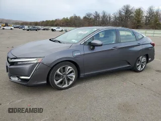 2018 Honda Clarity with VIN JHMZC5F19JC016997, listed as a Copart auction lot 46618465 with 90,038 mi miles and Salvage Title. Bid and sale history available at DreamBid. Image 1.
