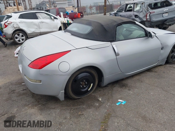 2006 Nissan 350Z Touring with VIN JN1AZ36A36M450659, listed as a IAAI auction lot 42034870 with 77,544 mi miles. Bid and sale history available at carsss.com. Image 4.