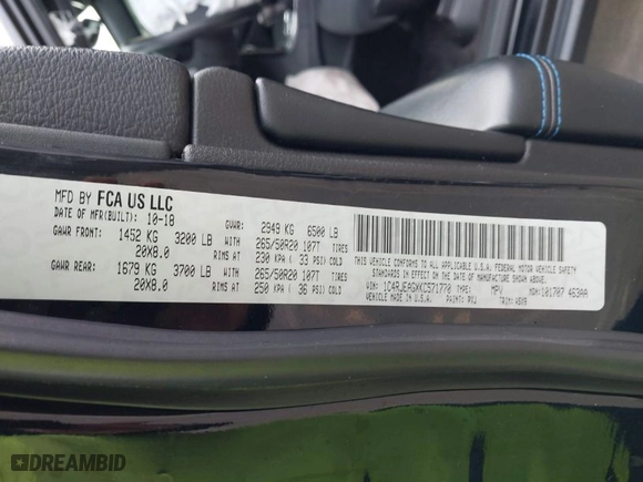 2019 Jeep Grand Cherokee Laredo E with VIN 1C4RJEAGXKC571770, listed as a IAAI auction lot 41677487 with 113,089 mi miles. Bid and sale history available at carsss.com. Image 9.