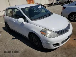 2007 Nissan Versa 1.8 S with VIN 3N1BC13E57L439319, listed as a Copart auction lot 72720894 with 103,738 mi miles and Salvage Title. Bid and sale history available at carsss.com. Image 4.