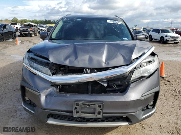 2019 Honda Pilot Touring 8-Passenger with VIN 5FNYF5H96KB041044, listed as a Copart auction lot 85808604 with 126,168 mi miles and Salvage Title. Bid and sale history available at carsss.com. Image 5.