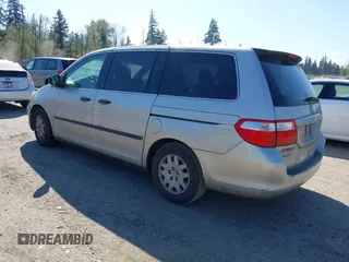 2006 Honda Odyssey LX with VIN 5FNRL38236B127129, listed as a IAAI auction lot 42041994 with 282,313 mi miles. Bid and sale history available at carsss.com. Image 3.