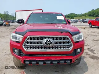 2017 Toyota Tacoma SR5 z VIN 3TMCZ5AN5HM066093, wystawiony jako IAAI lot #42370102 z przebiegiem 115 327 mil mil oraz . Historia ofert i sprzedaży dostępna na DreamBid. Obrazek 6.