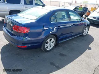 2013 Volkswagen Jetta Sedan Hybrid SE with VIN 3VW637AJ8DM227714, listed as a IAAI auction lot 41979740 with 170,648 mi miles. Bid and sale history available at carsss.com. Image 4.