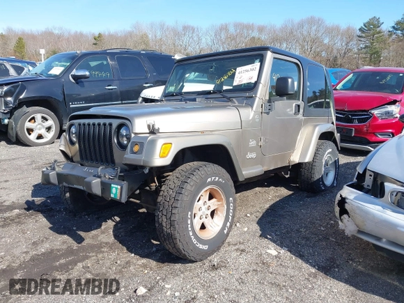 2004 Jeep Wrangler Sahara with VIN 1J4FA59S14P772264, listed as a IAAI auction lot 41814074 with 165,750 mi miles and . Bid and sale history available at DreamBid. Image 2.