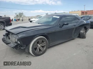 2015 Dodge Challenger SXT with VIN 2C3CDZAG1FH816399, listed as a Copart auction lot 76309264 with 112,620 mi miles and Salvage Title. Bid and sale history available at carsss.com. Image 1.