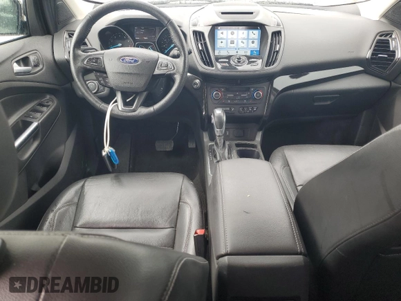 2018 Ford Escape Titanium z VIN 1FMCU9J94JUB49827, wystawiony jako Copart lot #55697385 z przebiegiem 98 682 mil mil oraz Szkoda całkowita • Salvage title. Historia ofert i sprzedaży dostępna na DreamBid. Obrazek 8.