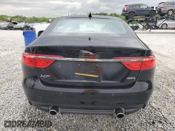 2016 Jaguar XF 35t Prestige with VIN SAJBE4BVXGCY03824, listed as a Copart auction lot 52516645 with 96,616 mi miles and Salvage Title. Bid and sale history available at carsss.com. Image 6.