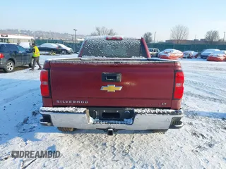 2014 Chevrolet Silverado 1500 LT with VIN 1GCVKREC1EZ214506, listed as a IAAI auction lot 41316320 with 128,519 mi miles and . Bid and sale history available at DreamBid. Image 16.