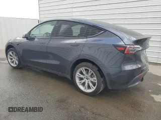 2024 Tesla Model Y with VIN 7SAYGDED4RF017614, listed as a Copart auction lot 45754675 with 11,209 mi miles and Salvage title. Bid and sale history available at DreamBid. Image 2.