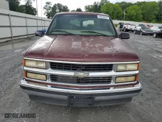 1999 Chevrolet Suburban with VIN 3GNEC16RXXG260623, listed as a Copart auction lot 54609694 with 246,460 mi miles and Salvage Title. Bid and sale history available at carsss.com. Image 5.