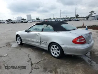 2004 Mercedes-Benz CLK Cabriolet 3.2L with VIN WDBTK65G94T017124, listed as a Copart auction lot 82833254 with 232,402 mi miles and Salvage Title. Bid and sale history available at carsss.com. Image 2.