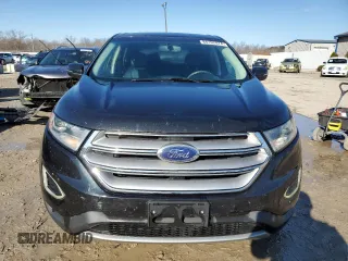 2015 Ford Edge Titanium z VIN 2FMTK3K91FBB52506, wystawiony jako Copart lot #84192474 z przebiegiem 136 437 mil mil oraz Nie do naprawy • Non repairable. Historia ofert i sprzedaży dostępna na DreamBid. Obrazek 5.