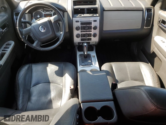 2008 Mercury Mariner с VIN 4M2CU81128KJ48913, выставлен на аукционе Copart как лот 61588355 с пробегом 84 883 миль миль и Списание • Salvage title. История ставок и продаж доступна на DreamBid. Изображение 8.