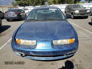 2001 Saturn SL z VIN 1G8ZF52861Z275529, wystawiony jako Copart lot #74153154 z przebiegiem 171 272 mil mil oraz Tytuł czysty. Historia ofert i sprzedaży dostępna na DreamBid. Obrazek 5.