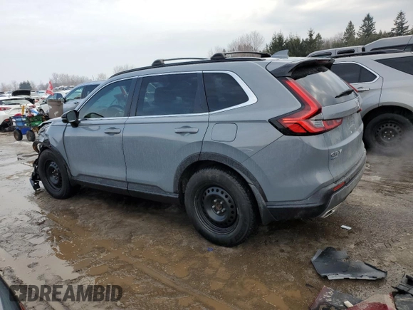 2023 Honda CR-V Sport Touring with VIN 2HKRS6H9XPH208925, listed as a Copart auction lot 46083575 with 63,658 mi miles and Salvage Title. Bid and sale history available at DreamBid. Image 2.