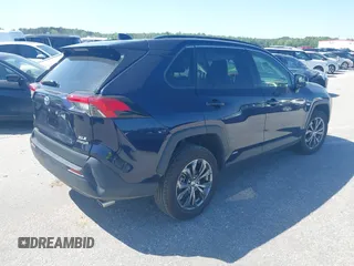 2023 Toyota RAV4 Hybrid XLE Premium with VIN JTMB6RFV4PD098886, listed as a IAAI auction lot 42112706 with 47,743 mi miles and . Bid and sale history available at DreamBid. Image 4.