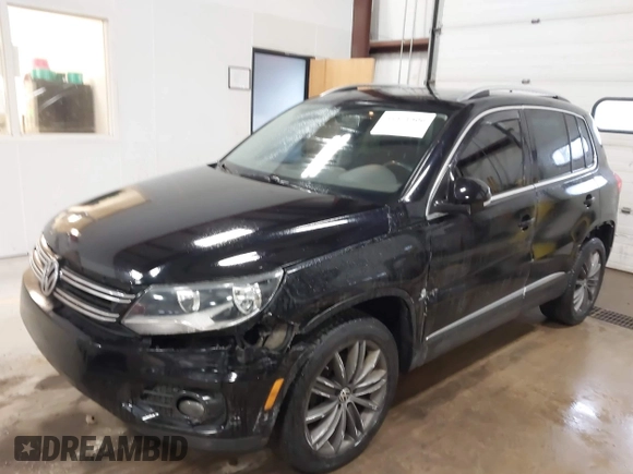 2013 Volkswagen Tiguan SE z VIN WVGBV7AX3DW508802, wystawiony jako IAAI lot #41471406 z przebiegiem 102 426 mil mil oraz . Historia ofert i sprzedaży dostępna na DreamBid. Obrazek 2.