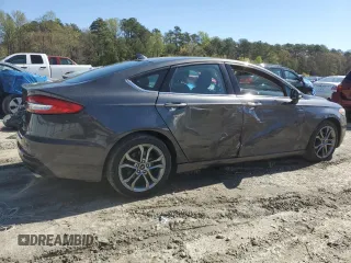 2020 Ford Fusion SEL z VIN 3FA6P0CD7LR196193, wystawiony jako Copart lot #53254465 z przebiegiem 79 944 mil mil oraz Szkoda całkowita • Salvage title. Historia ofert i sprzedaży dostępna na DreamBid. Obrazek 3.