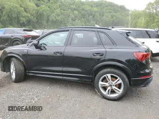 2021 Audi Q3 S line Premium with VIN WA1DECF39M1024927, listed as a Copart auction lot 58992105 with 100,886 mi miles and Salvage title. Bid and sale history available at DreamBid. Image 2.